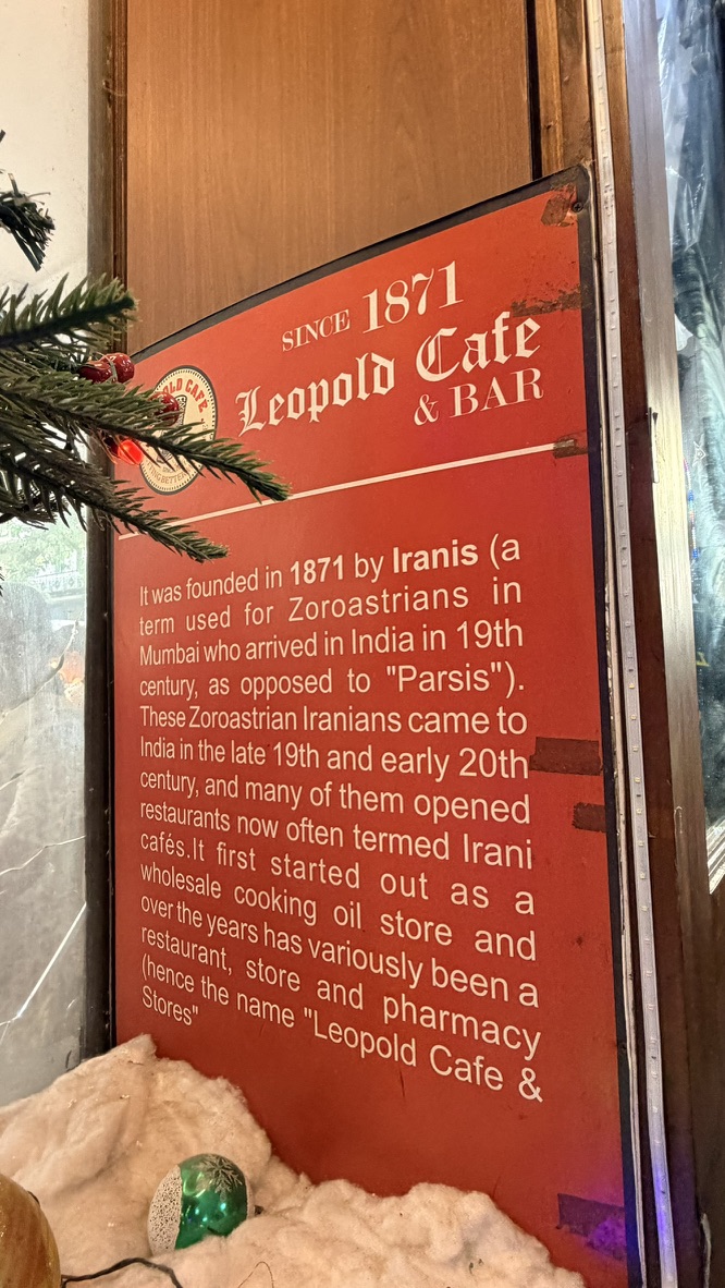 History sign inside Leopold Café, Mumbai, India.