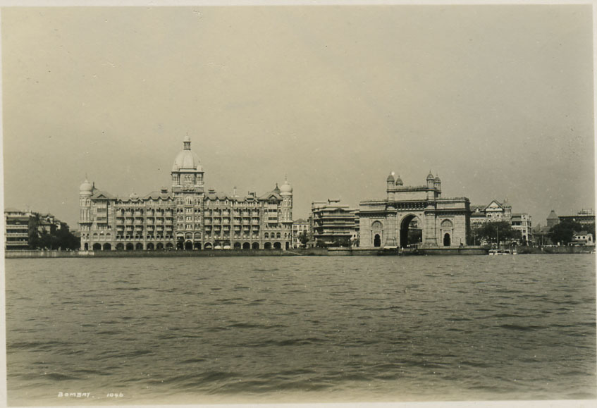 Gateway of India and Taj Mahal Palace seen from the harbour in the 1930s, Mumbai, India.
