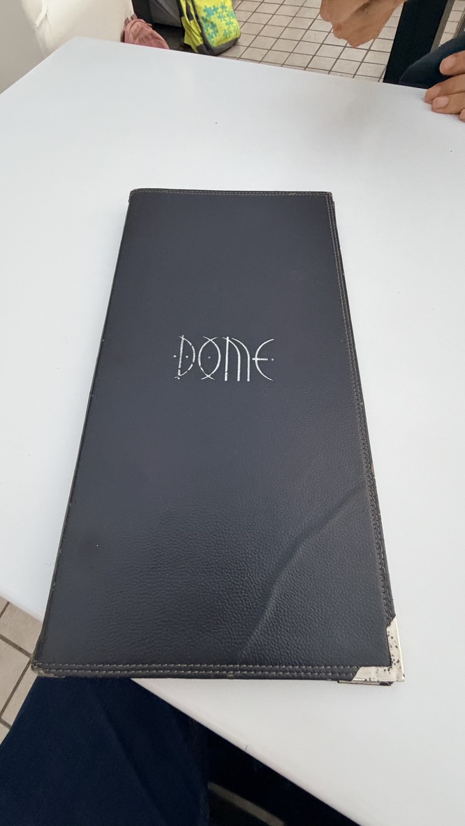Dome bar menu on a rooftop table at InterContinental Marine Drive, Mumbai, India.
