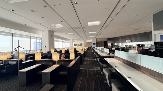 Quiet airport lounge seating during a connection at Tokyo Haneda Airport, Japan.