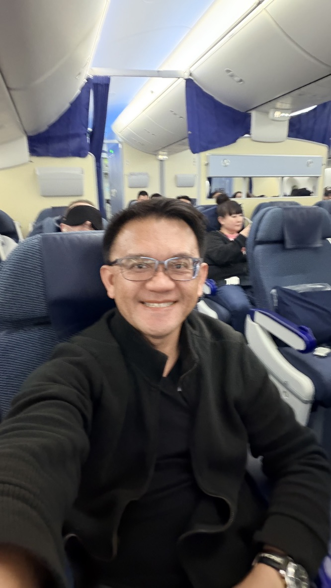 Traveller inside the ANA aircraft cabin on the journey through Japan.