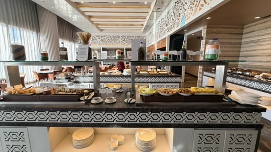 Fresh food buffet inside the Adani Lounge at Mumbai airport, India.