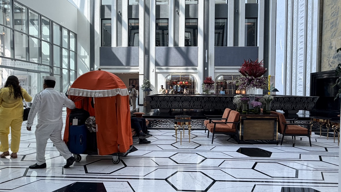 The bright black-and-white atrium lobby at ITC Narmada, a Luxury Collection Hotel in Ahmedabad
