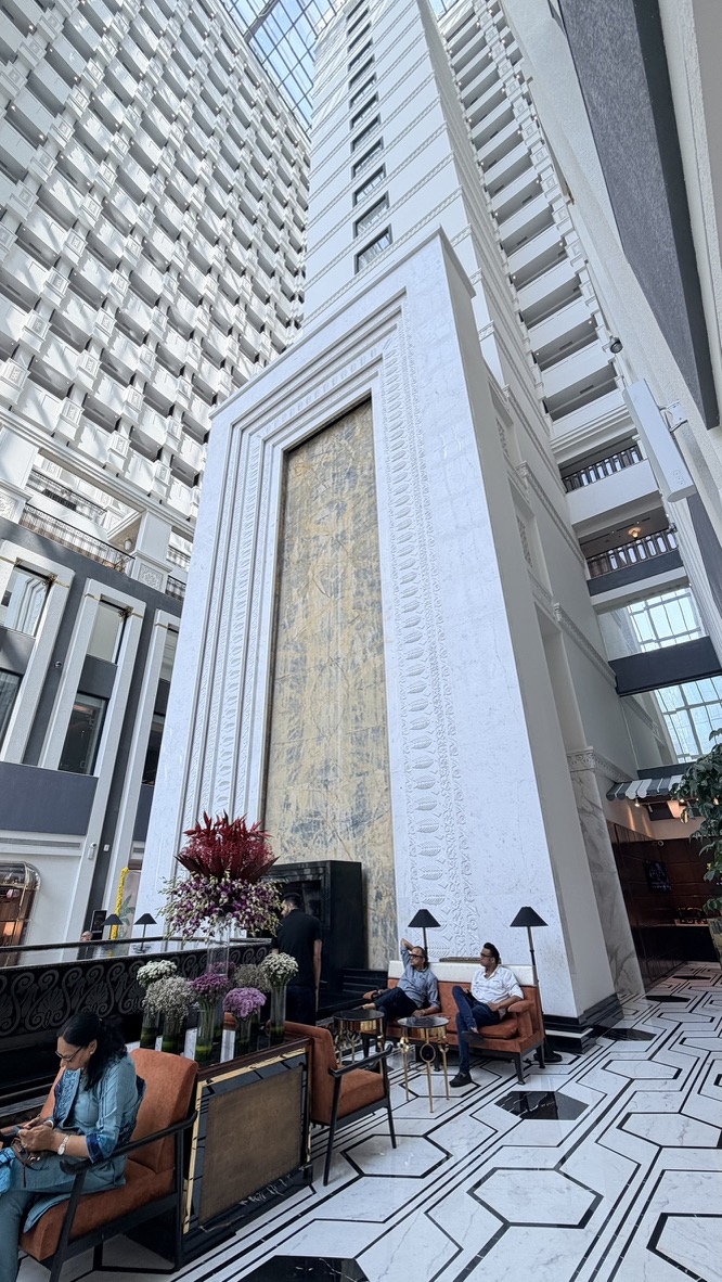 Looking upward through the tall stepwell-inspired atrium at ITC Narmada Ahmedabad