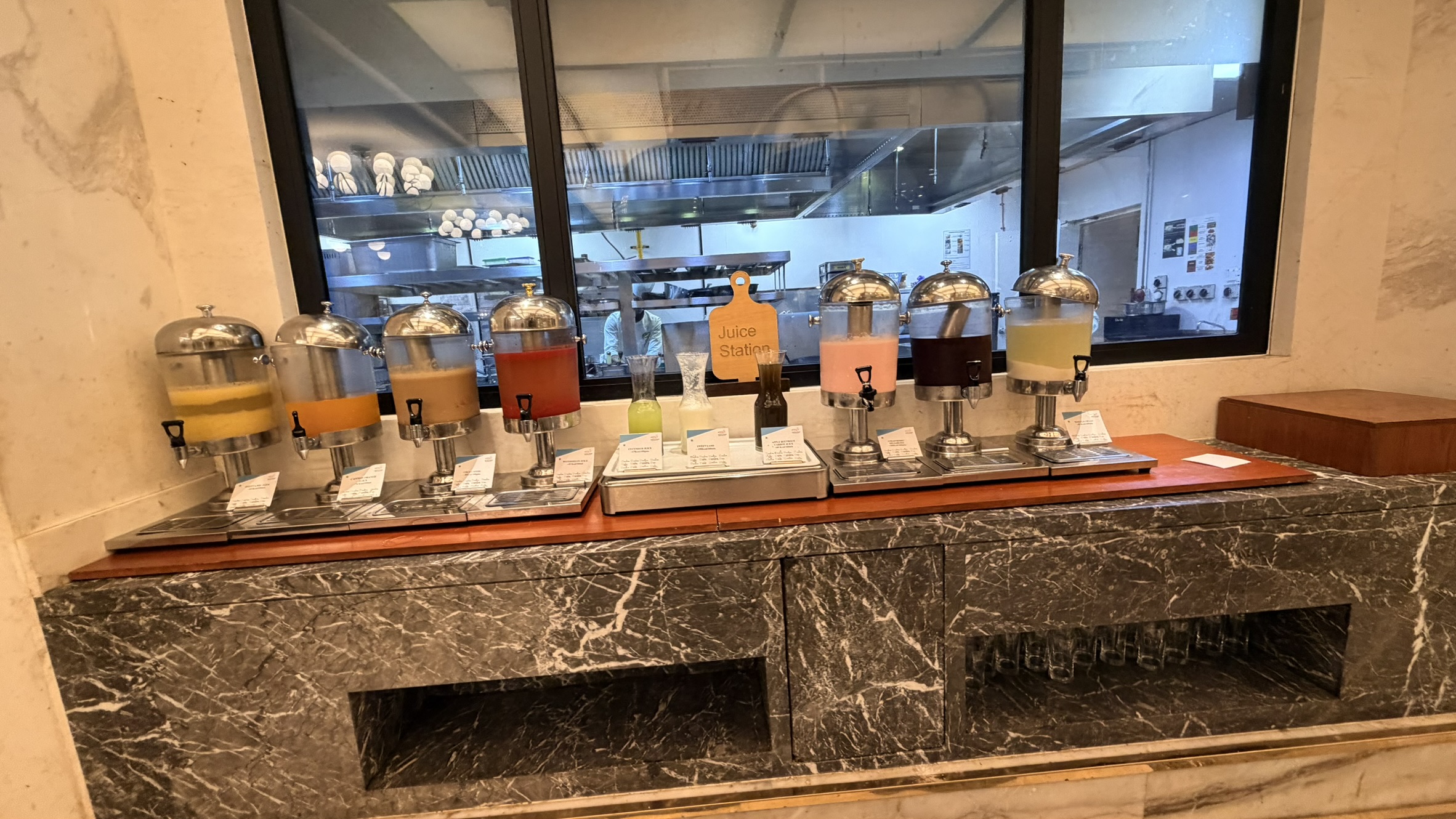 Colorful juice and beverage station at the ITC Narmada breakfast buffet
