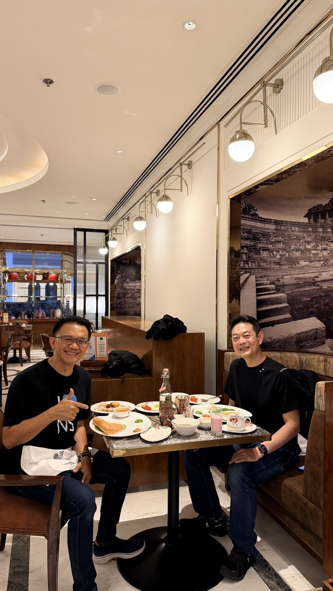 TOON and his travel companion having breakfast together at ITC Narmada Ahmedabad
