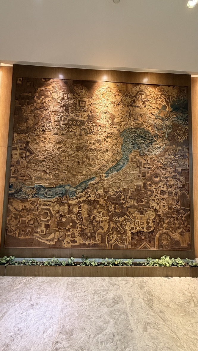 Large textured artwork inspired by Ahmedabad and the Sabarmati River inside Hyatt Regency Ahmedabad