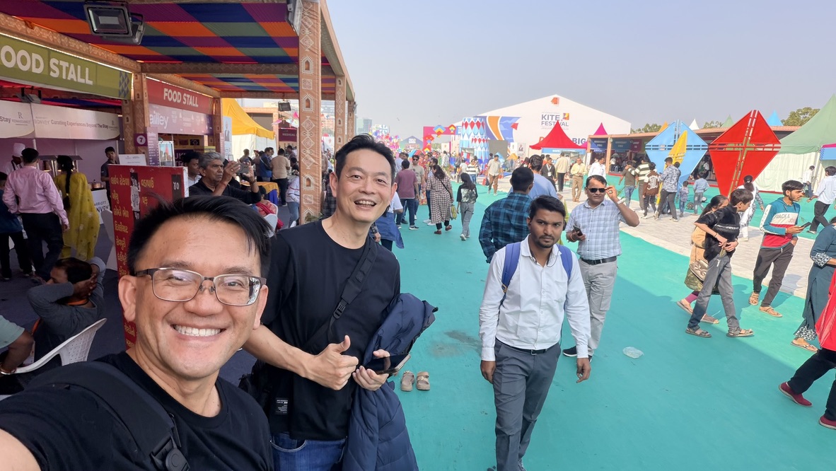TOON and his travel companion together among visitors at the Ahmedabad International Kite Festival