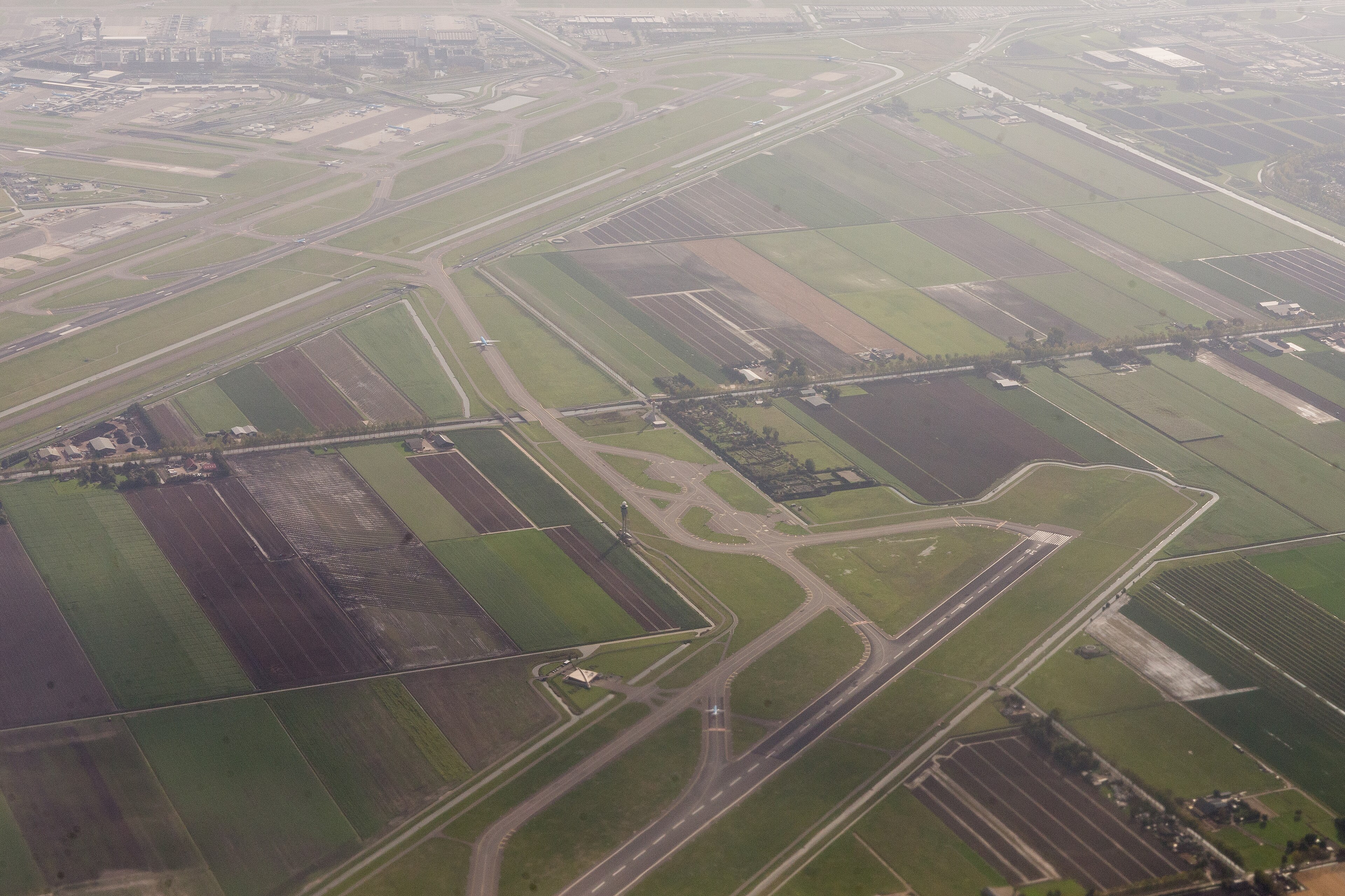 Aerial view of the runways and fields surrounding Amsterdam Airport Schiphol