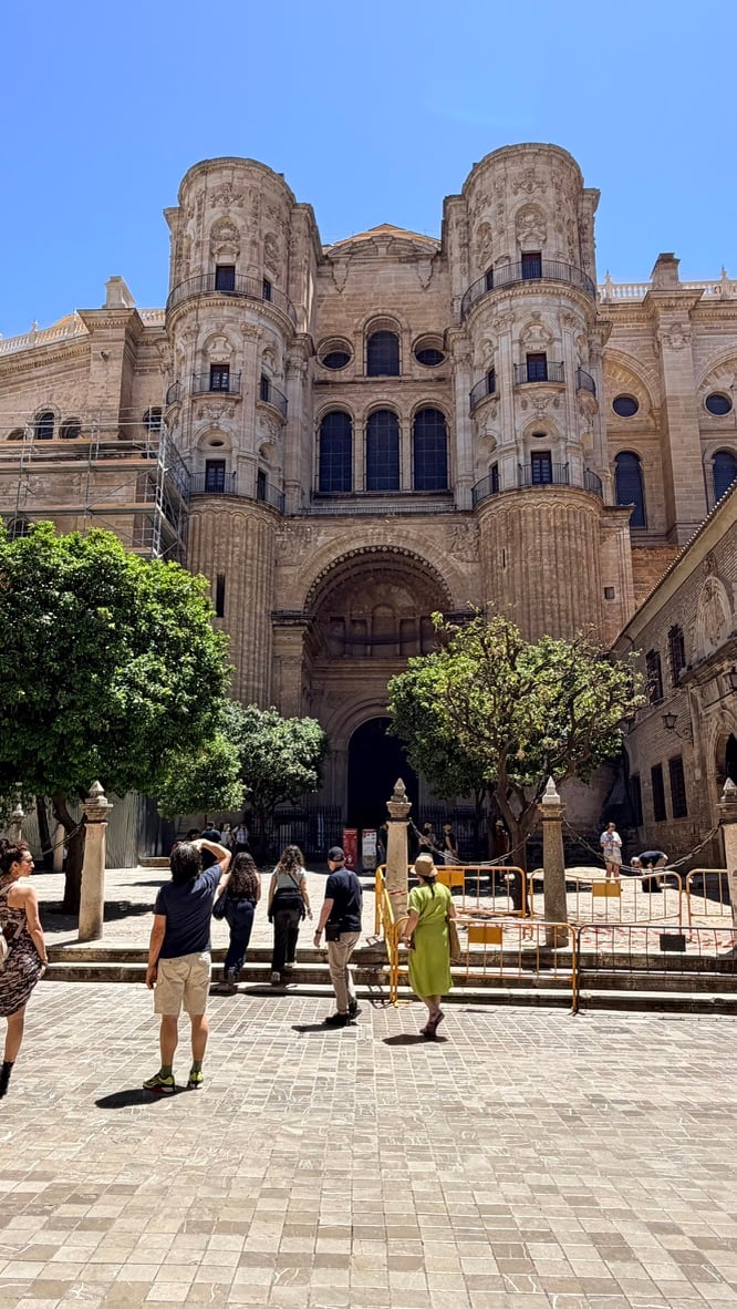 TOON’s view of the monumental stone façade of Málaga Cathedral