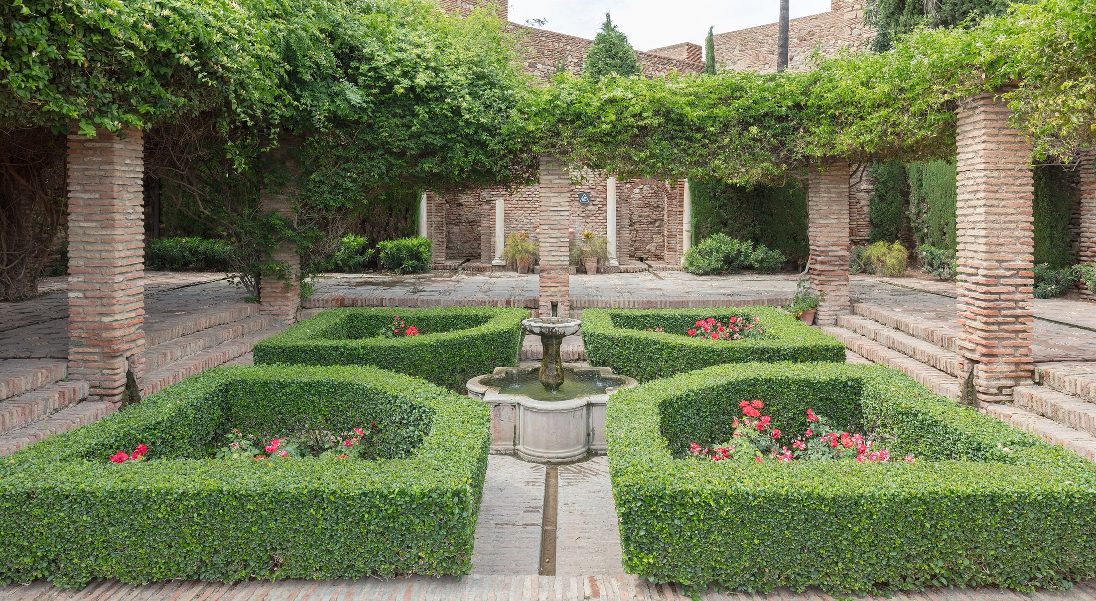 A geometric garden and fountain inside Málaga’s Alcazaba