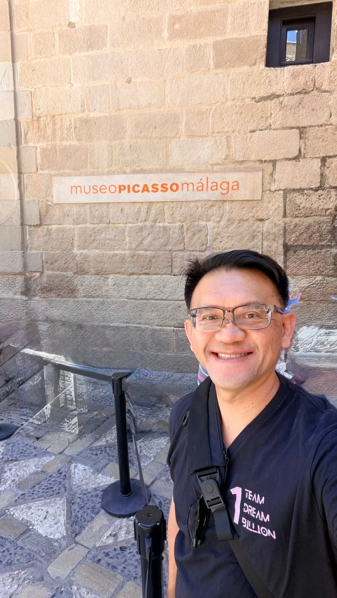 TOON smiling outside Museo Picasso Málaga at the start of his visit